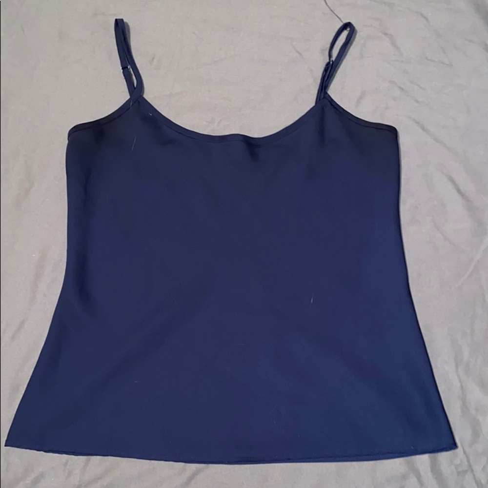 Blue tank top. No tags. Fits like M/L